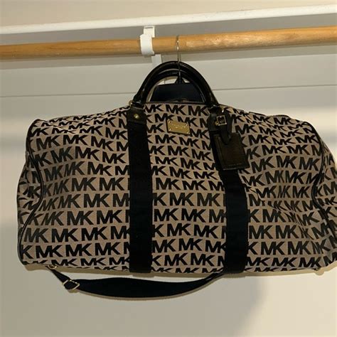 michael kors mens duffle bags|michael kors duffle bag women's.